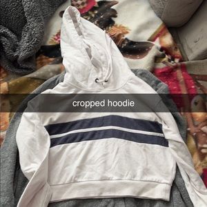 selling this cropped white hoodie.